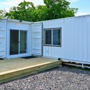 Luxury two bedroom shipping container home built from one 40ft and one 20ft high cube shipping container featuring modern kitchen, bathroom and spacious living area.